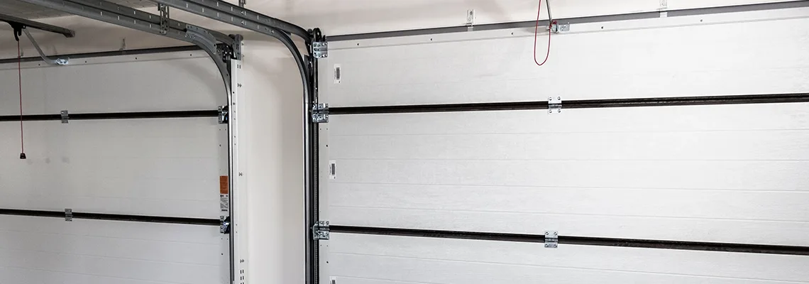 Fix Folding Garage Door Jerking in Pompano Beach