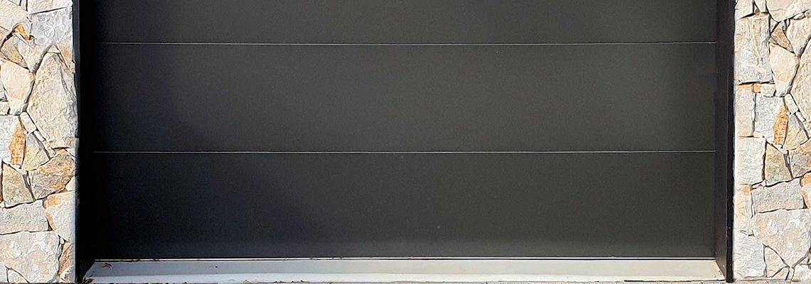 Overhead Black Garage Door Installation in Pompano Beach, Florida