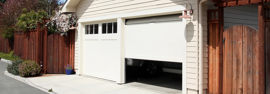 Fix Metal Garage Door Jerking in Pompano Beach